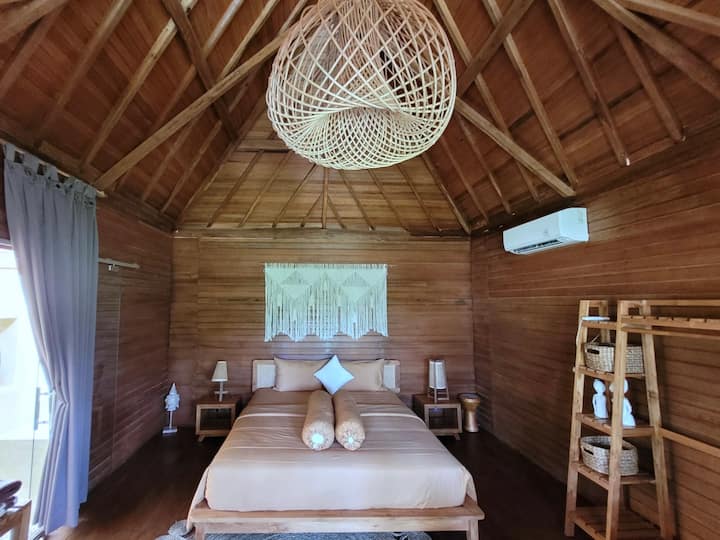 Tala boutique bungalow room with bed and air conditioning